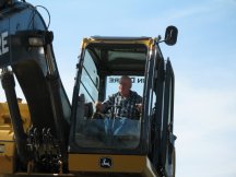 Jock in the cab of his trackhoe