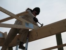 Laura secures the second truss