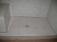 Laying the tile in the shower
