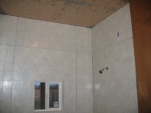 Working on the top of the shower